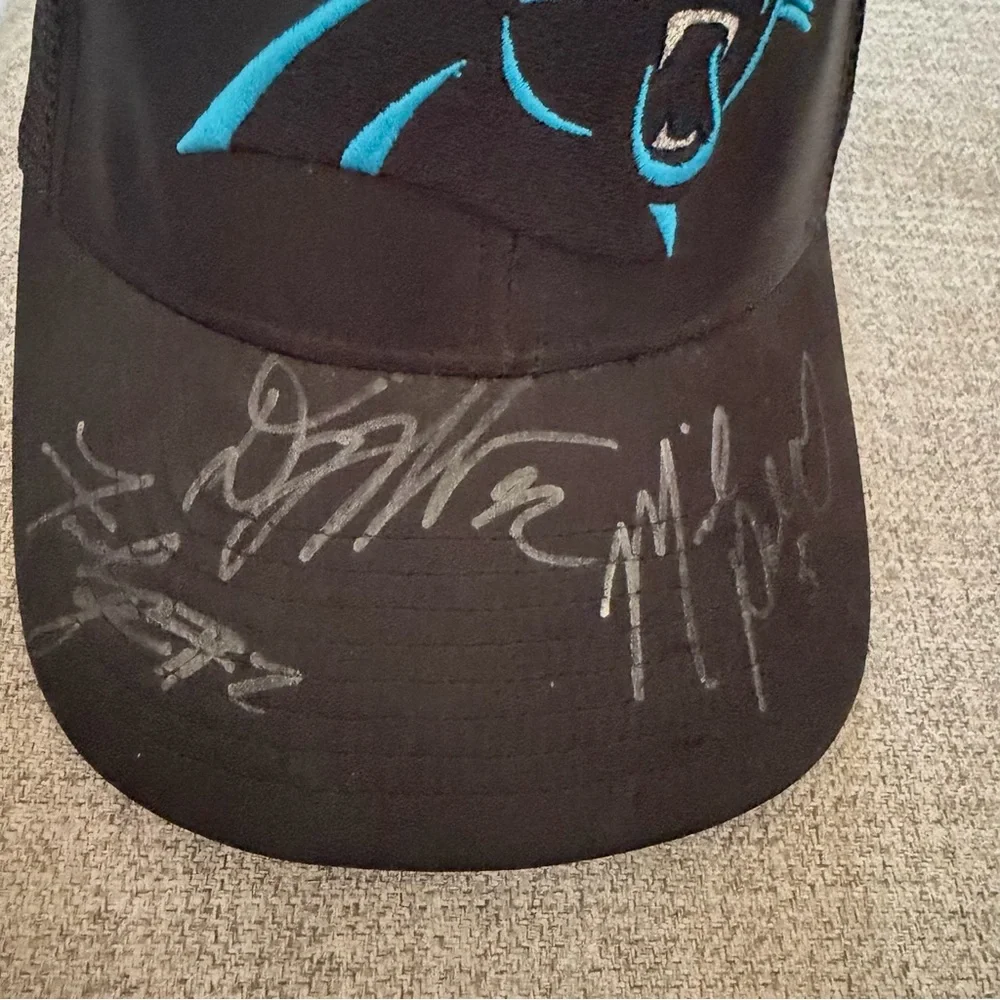 North Carolina NC Panthers Black Trucker Hat with Teal Logo 47 signed autograph